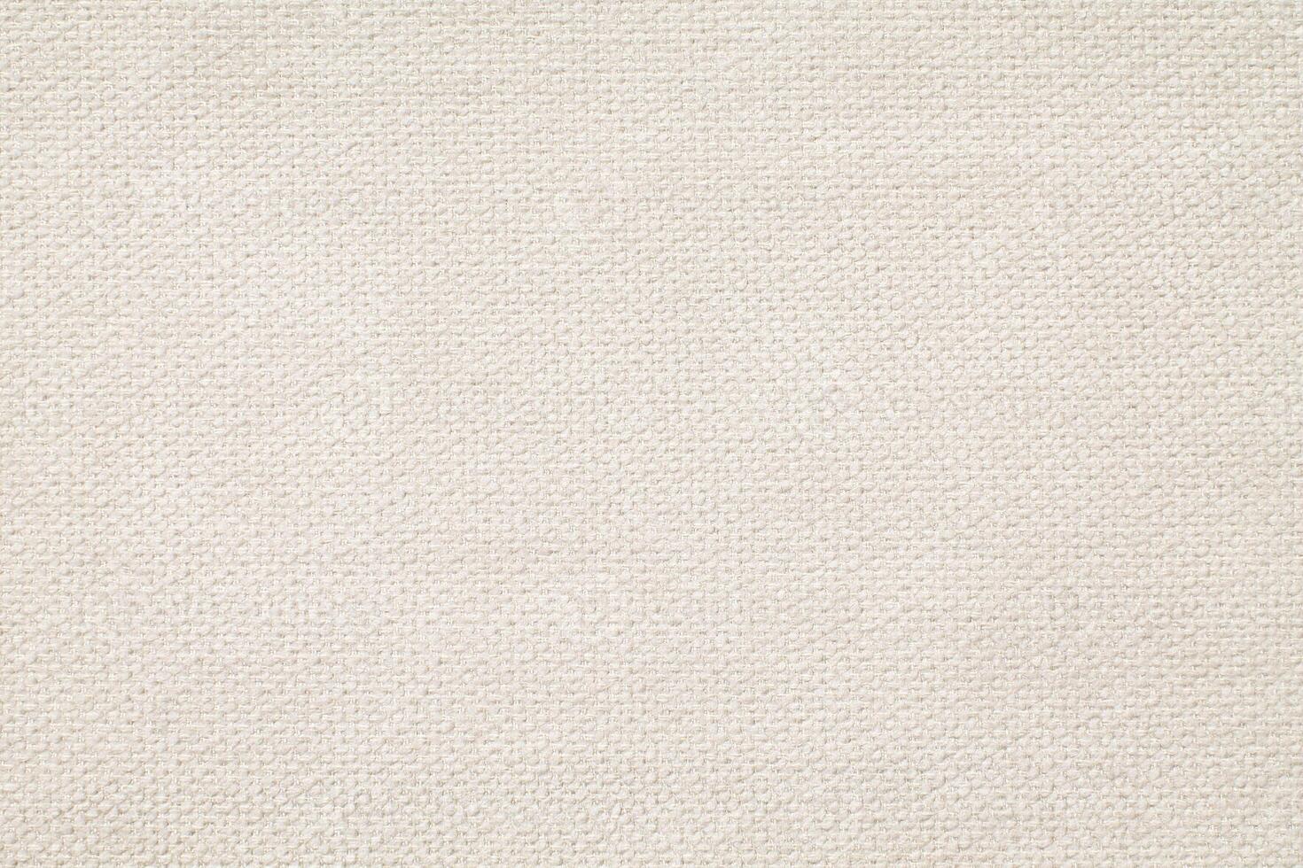 Natural Linen Material Textile Canvas Fabric Texture Background Close-up Detail of Fabric Natural Color Hemp Material Pattern Design Wallpaper. Can be Used as Background or For Graphic Design photo