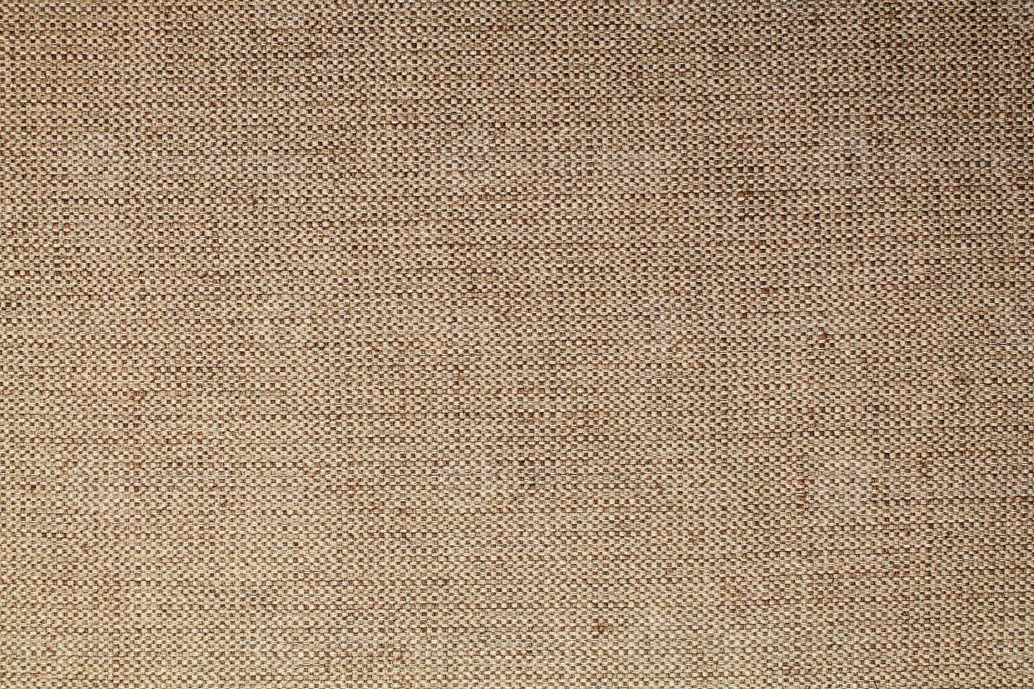 Natural Linen Material Textile Canvas Fabric Texture Background Close-up Detail of Fabric Natural Color Hemp Material Pattern Design Wallpaper. Can be Used as Background or For Graphic Design photo