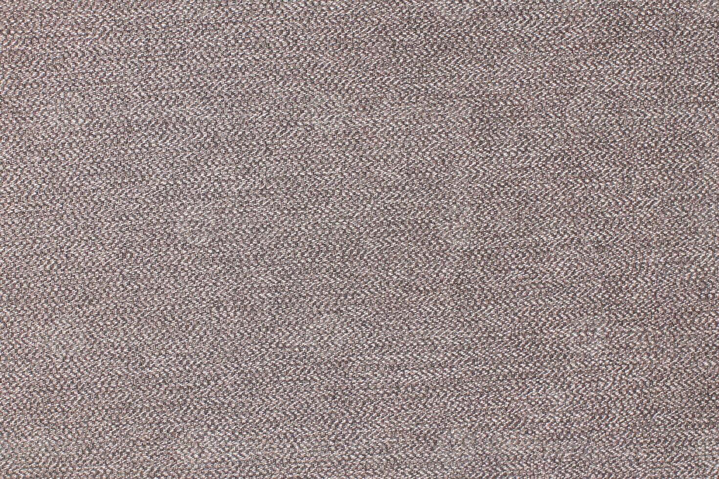 Natural Linen Material Textile Canvas Fabric Texture Background Close-up Detail of Fabric Natural Color Hemp Material Pattern Design Wallpaper. Can be Used as Background or For Graphic Design photo