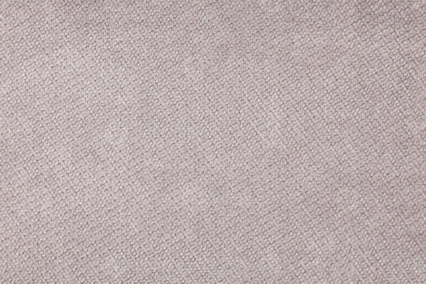 Natural Linen Material Textile Canvas Fabric Texture Background Close-up Detail of Fabric Natural Color Hemp Material Pattern Design Wallpaper. Can be Used as Background or For Graphic Design photo