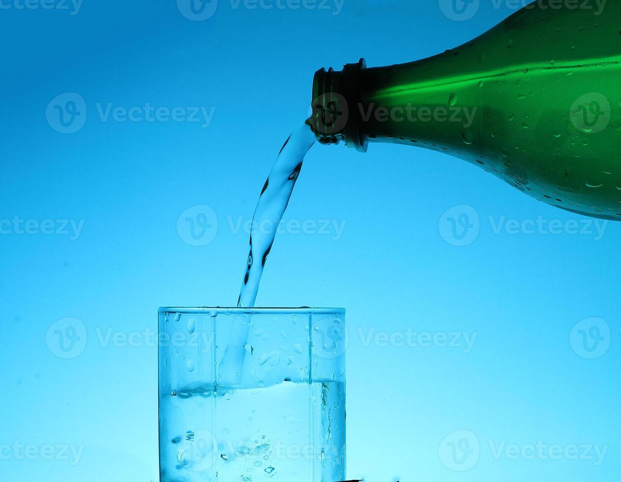 Fresh Water With Underwater Bubbles Texture on a Blue Background Close-up Abstract Liquid Bubbles Aqua Design Wallpaper photo
