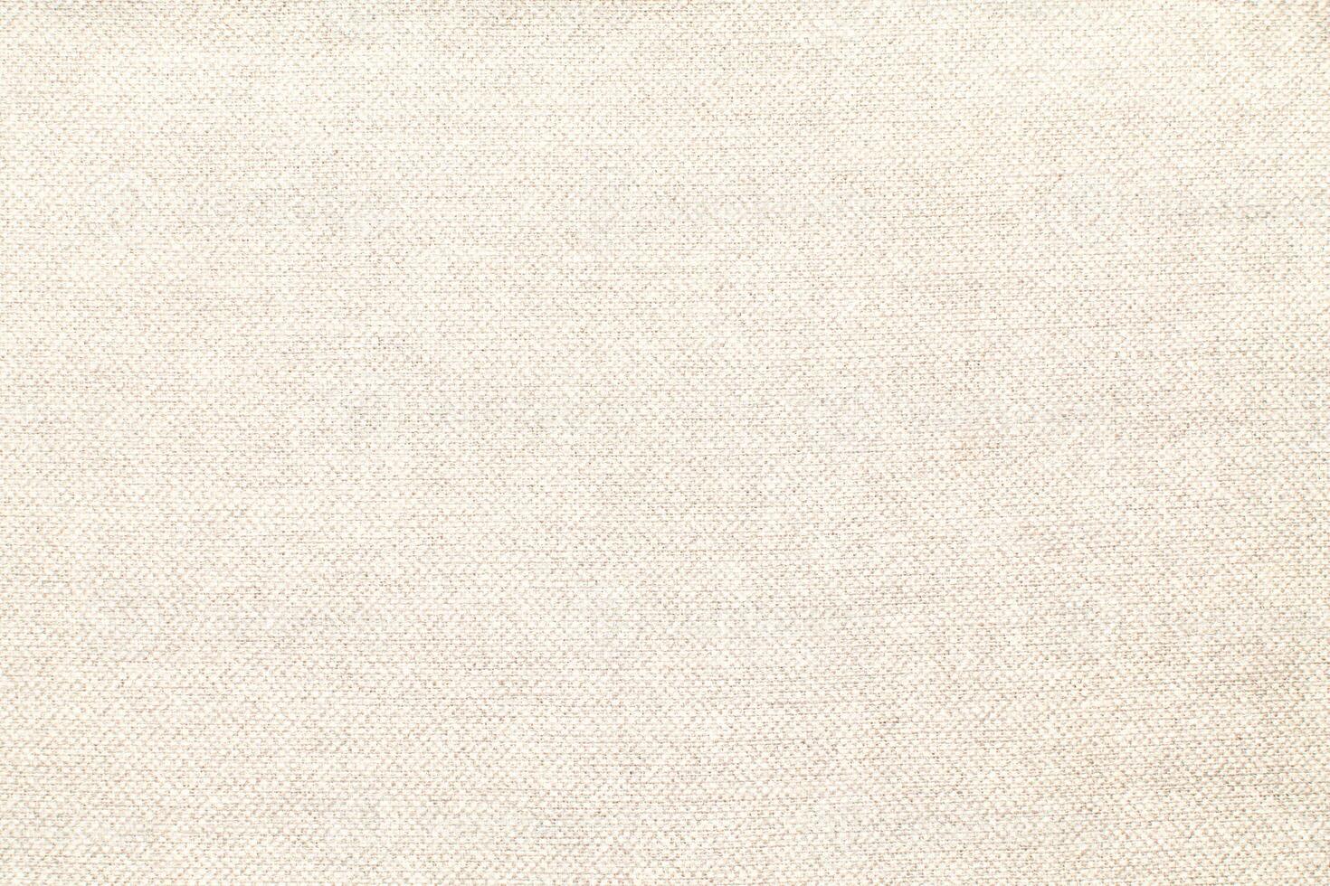 Natural Linen Material Textile Canvas Fabric Texture Background Close-up Detail of Fabric Natural Color Hemp Material Pattern Design Wallpaper. Can be Used as Background or For Graphic Design photo