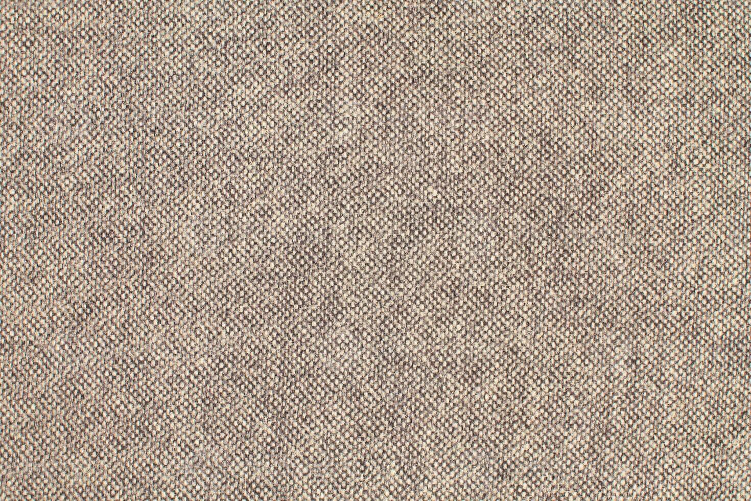 Natural Linen Material Textile Canvas Fabric Texture Background Close-up Detail of Fabric Natural Color Hemp Material Pattern Design Wallpaper. Can be Used as Background or For Graphic Design photo