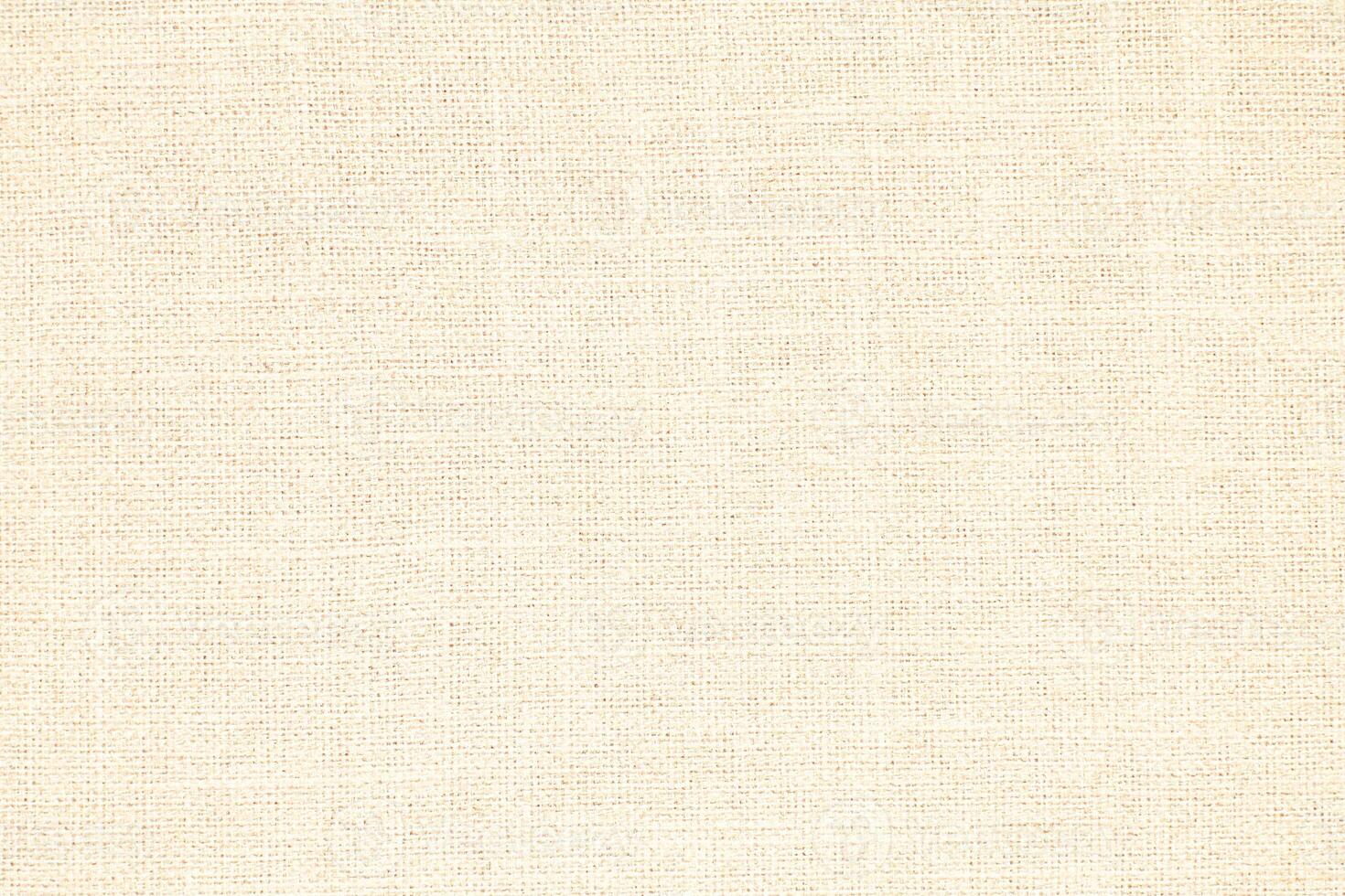 Natural Linen Material Textile Canvas Fabric Texture Background Close-up Detail of Fabric Natural Color Hemp Material Pattern Design Wallpaper. Can be Used as Background or For Graphic Design photo