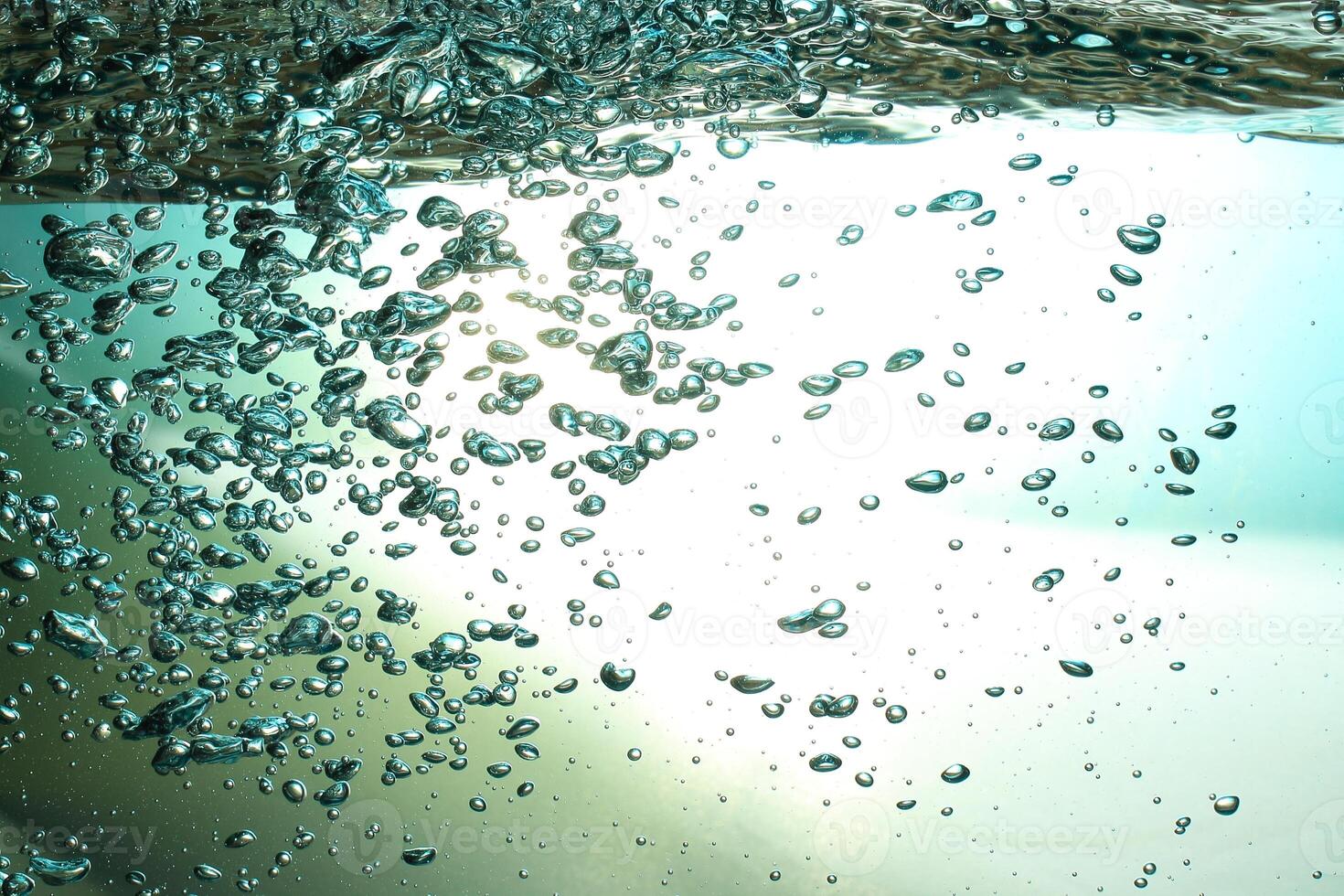 Fresh Water With Underwater Bubbles Texture on a Blue Background Close-up Abstract Liquid Bubbles Aqua Design Wallpaper photo