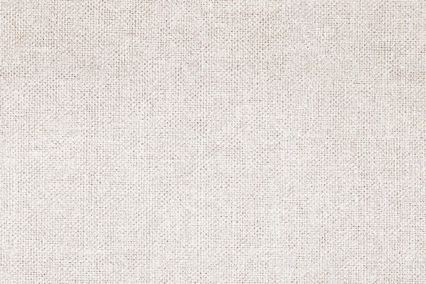 Natural Linen Material Textile Canvas Fabric Texture Background Close-up Detail of Fabric Natural Color Hemp Material Pattern Design Wallpaper. Can be Used as Background or For Graphic Design photo