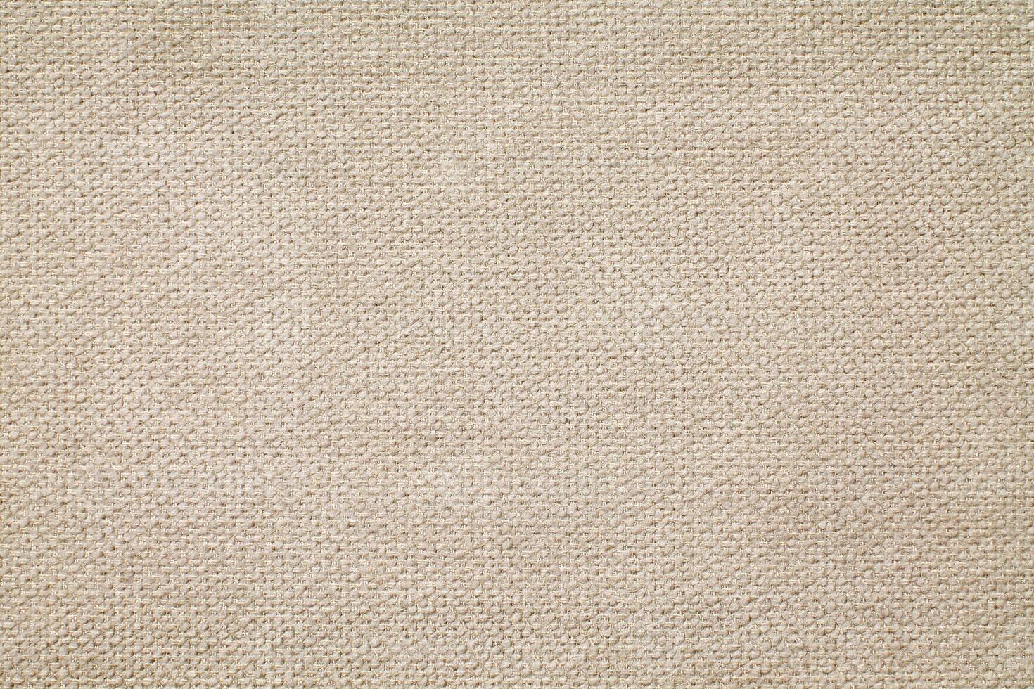 Natural Linen Material Textile Canvas Fabric Texture Background Close-up Detail of Fabric Natural Color Hemp Material Pattern Design Wallpaper. Can be Used as Background or For Graphic Design photo