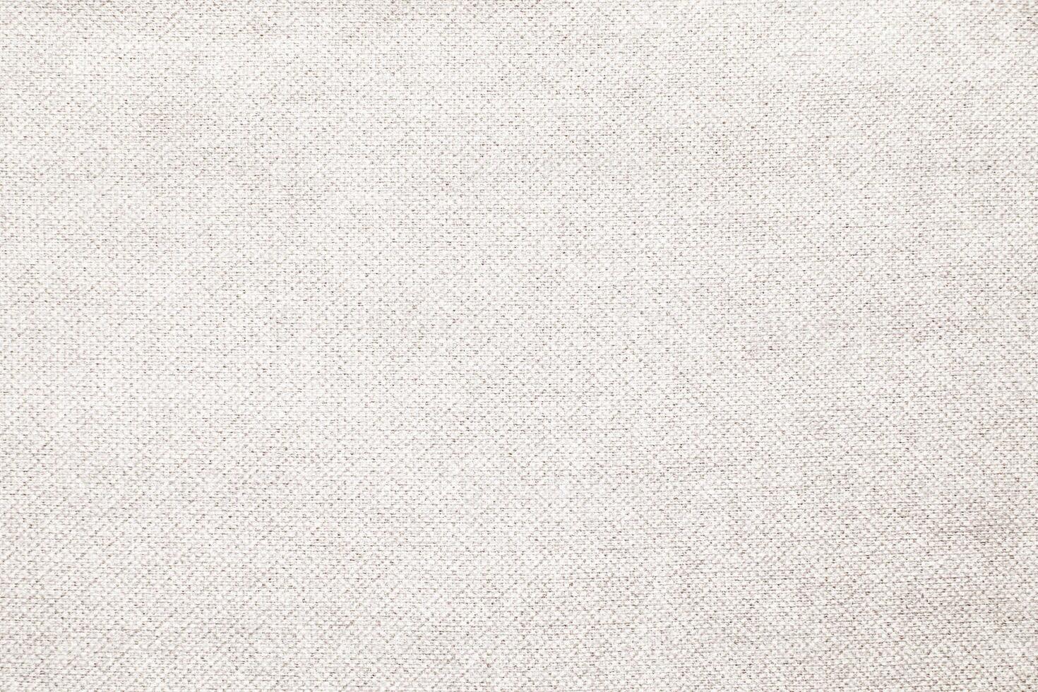 Natural Linen Material Textile Canvas Fabric Texture Background Close-up Detail of Fabric Natural Color Hemp Material Pattern Design Wallpaper. Can be Used as Background or For Graphic Design photo