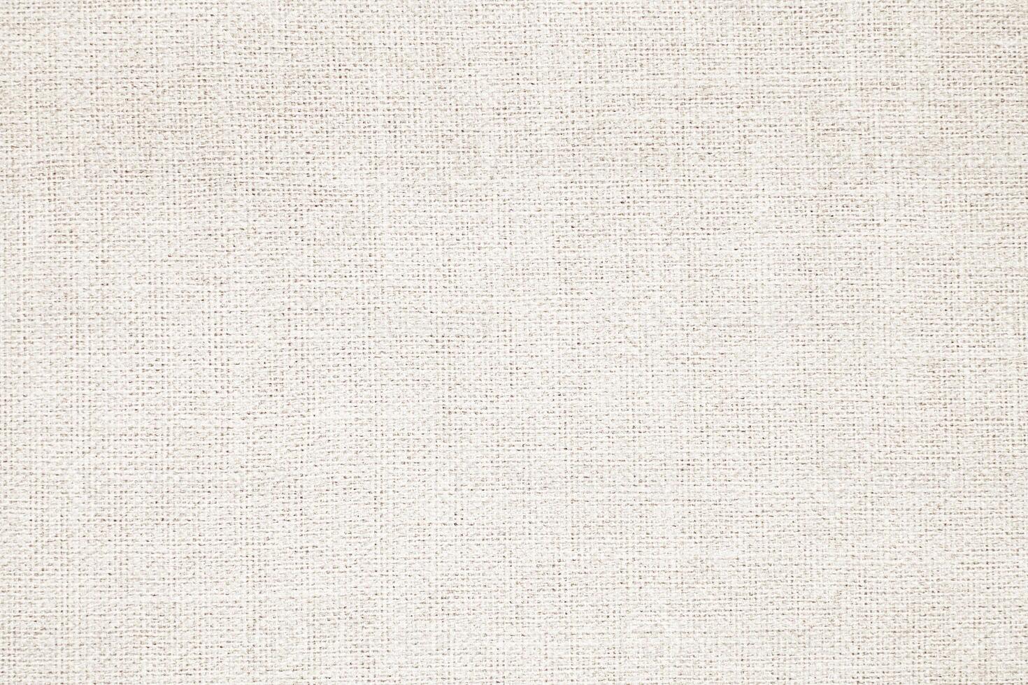 Natural Linen Material Textile Canvas Fabric Texture Background Close-up Detail of Fabric Natural Color Hemp Material Pattern Design Wallpaper. Can be Used as Background or For Graphic Design photo