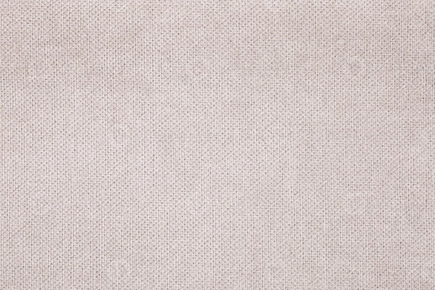 Natural Linen Material Textile Canvas Fabric Texture Background Close-up Detail of Fabric Natural Color Hemp Material Pattern Design Wallpaper. Can be Used as Background or For Graphic Design photo
