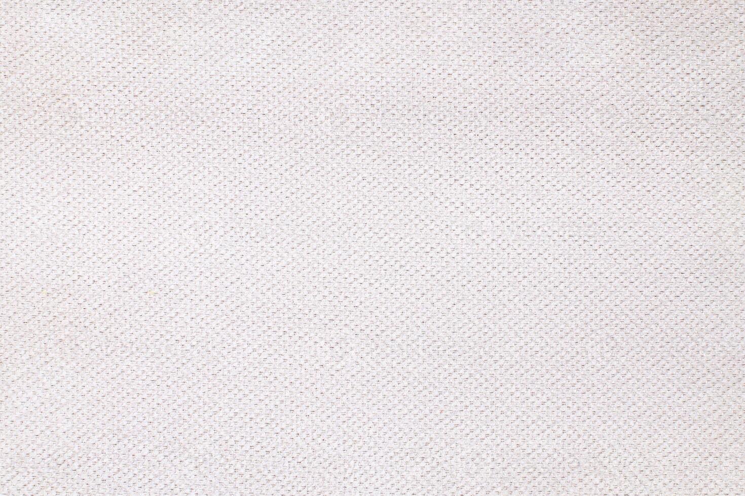 Natural Linen Material Textile Canvas Fabric Texture Background Close-up Detail of Fabric Natural Color Hemp Material Pattern Design Wallpaper. Can be Used as Background or For Graphic Design photo