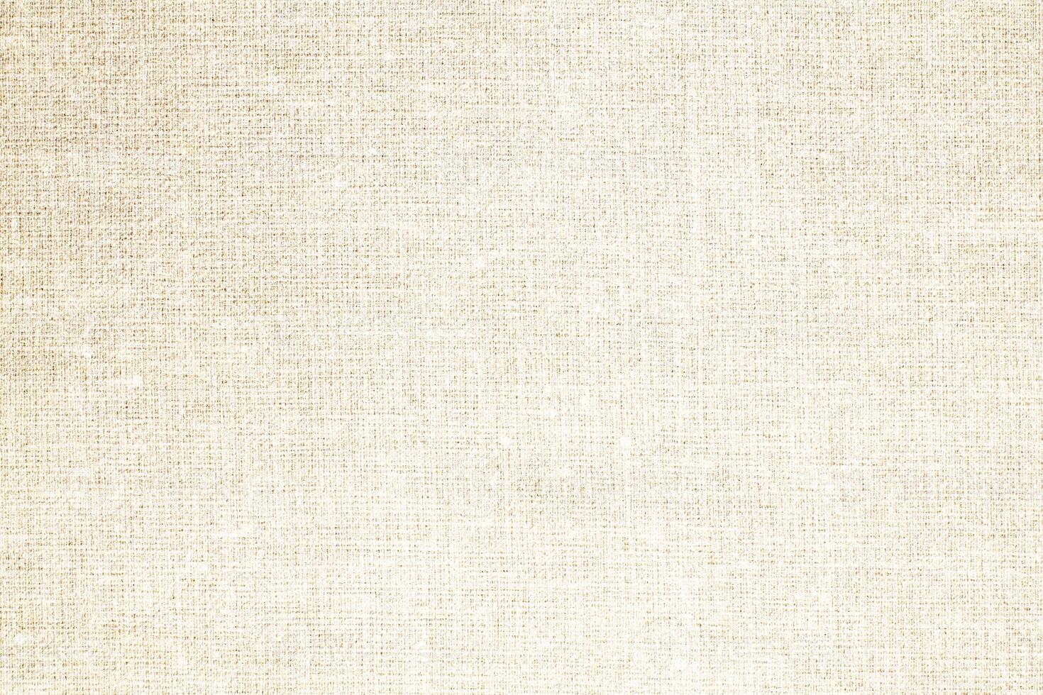 Natural Linen Material Textile Canvas Fabric Texture Background Close-up Detail of Fabric Natural Color Hemp Material Pattern Design Wallpaper. Can be Used as Background or For Graphic Design photo