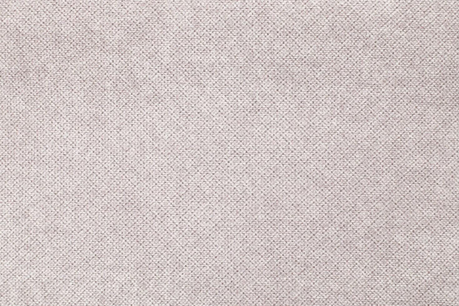 Natural Linen Material Textile Canvas Fabric Texture Background Close-up Detail of Fabric Natural Color Hemp Material Pattern Design Wallpaper. Can be Used as Background or For Graphic Design photo