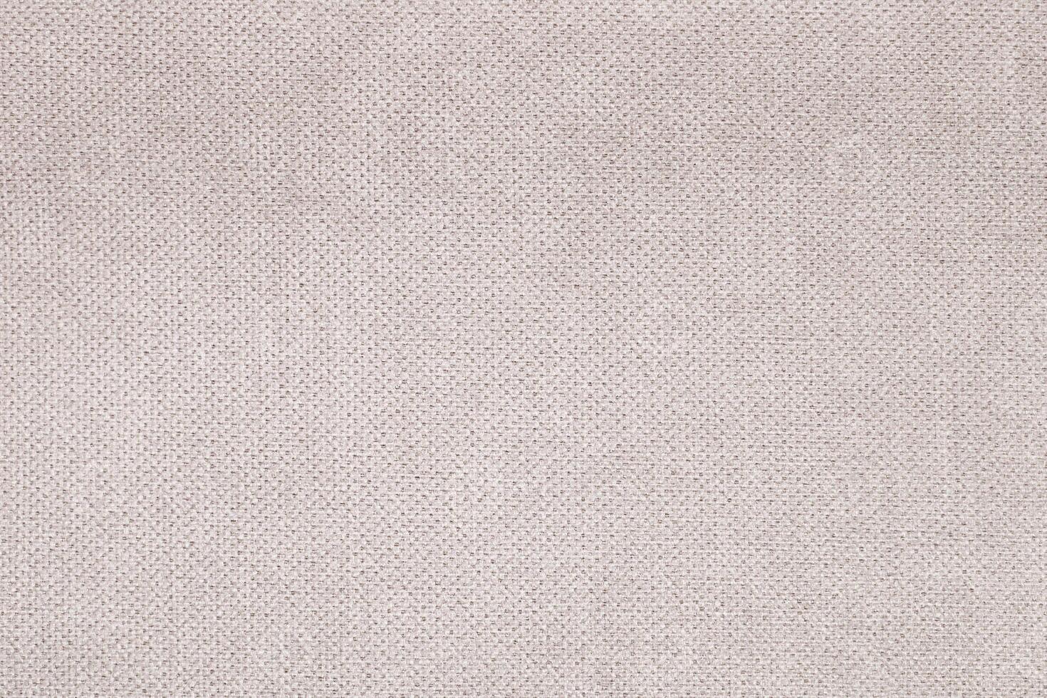 Natural Linen Material Textile Canvas Fabric Texture Background Close-up Detail of Fabric Natural Color Hemp Material Pattern Design Wallpaper. Can be Used as Background or For Graphic Design photo