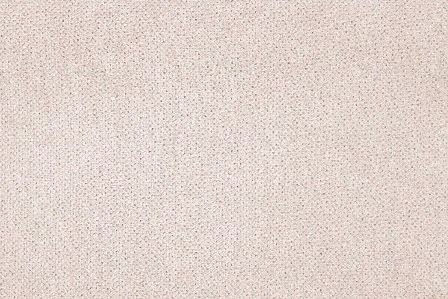Natural Linen Material Textile Canvas Fabric Texture Background Close-up Detail of Fabric Natural Color Hemp Material Pattern Design Wallpaper. Can be Used as Background or For Graphic Design photo