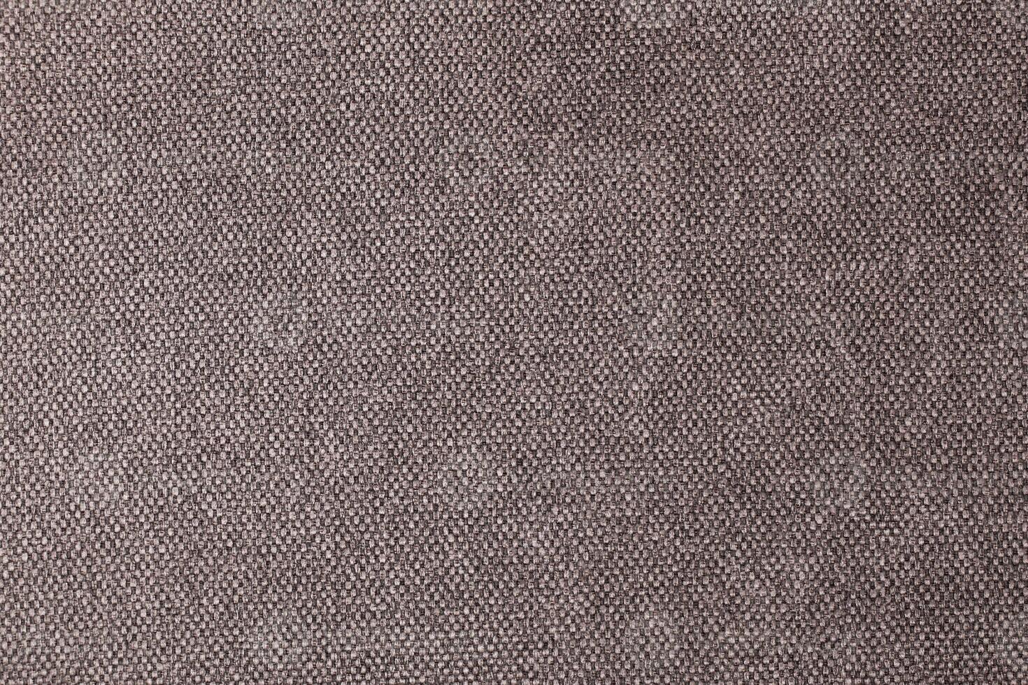 Natural Linen Material Textile Canvas Fabric Texture Background Close-up Detail of Fabric Natural Color Hemp Material Pattern Design Wallpaper. Can be Used as Background or For Graphic Design photo