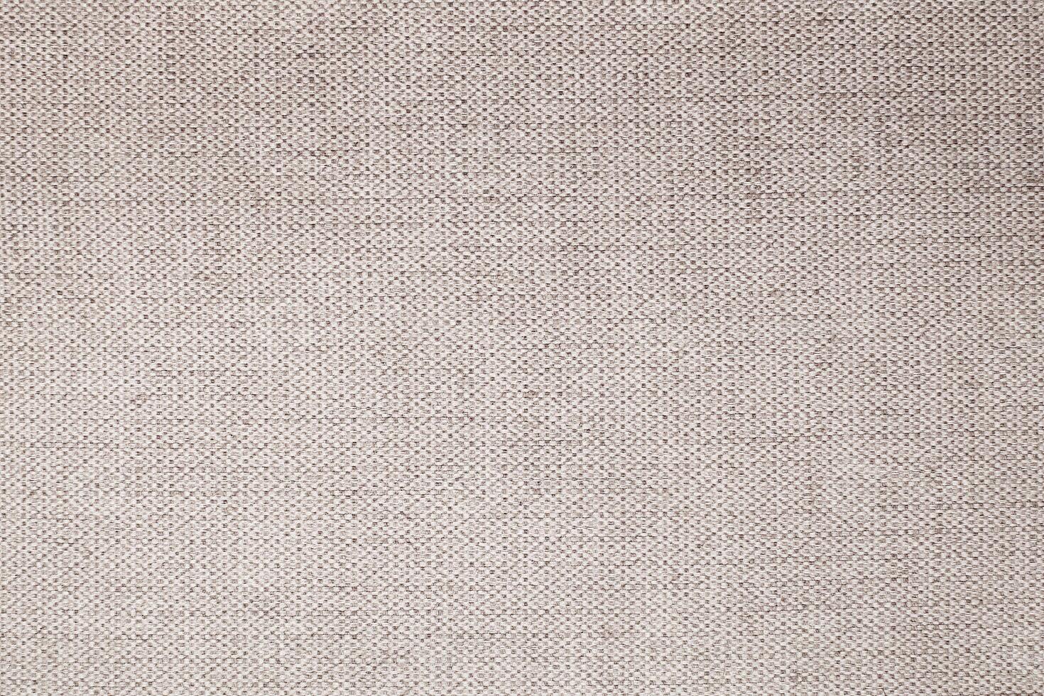 Natural Linen Material Textile Canvas Fabric Texture Background Close-up Detail of Fabric Natural Color Hemp Material Pattern Design Wallpaper. Can be Used as Background or For Graphic Design photo