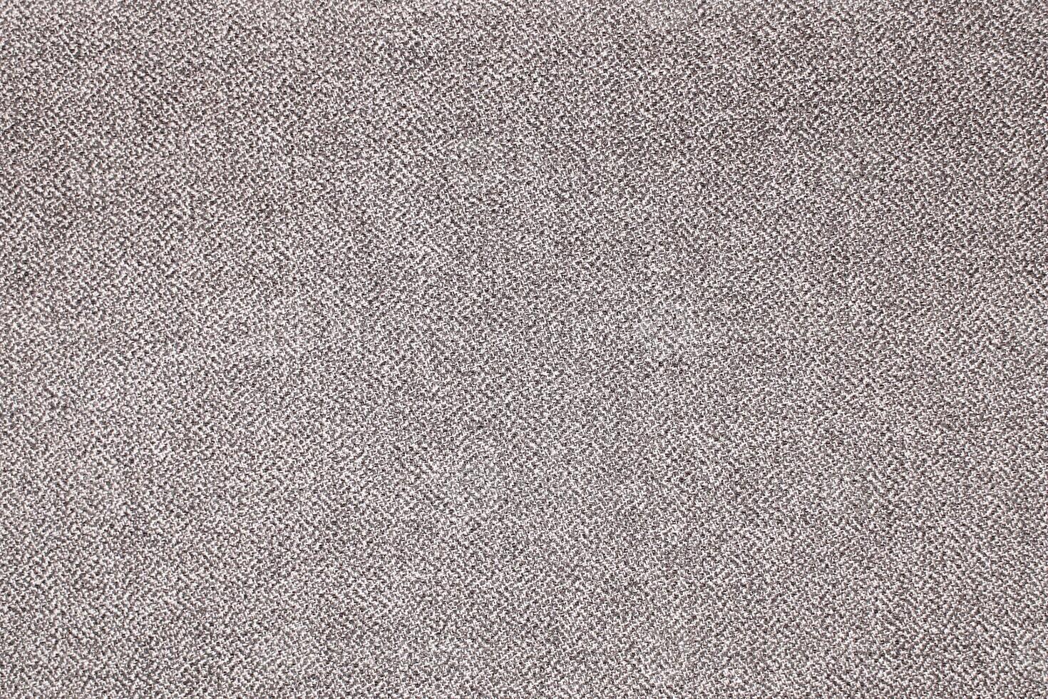 Natural Linen Material Textile Canvas Fabric Texture Background Close-up Detail of Fabric Natural Color Hemp Material Pattern Design Wallpaper. Can be Used as Background or For Graphic Design photo