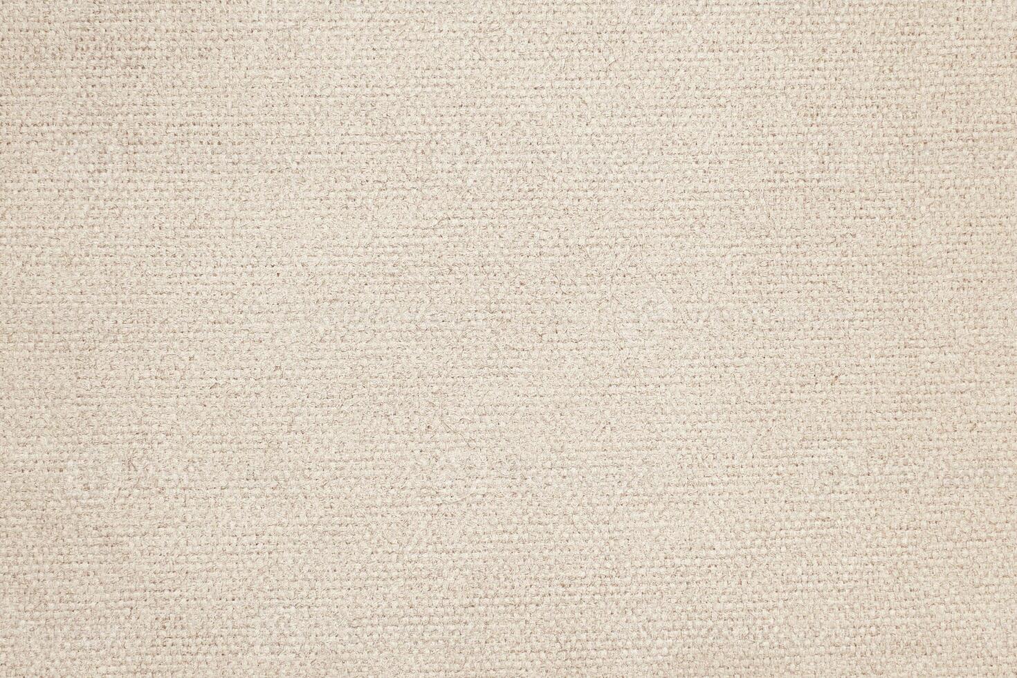 Natural Linen Material Textile Canvas Fabric Texture Background Close-up Detail of Fabric Natural Color Hemp Material Pattern Design Wallpaper. Can be Used as Background or For Graphic Design photo