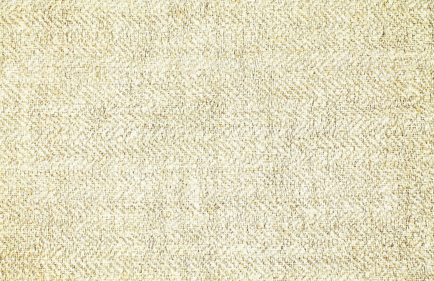 Natural Linen Material Textile Canvas Fabric Texture Background Close-up Detail of Fabric Natural Color Hemp Material Pattern Design Wallpaper. Can be Used as Background or For Graphic Design photo