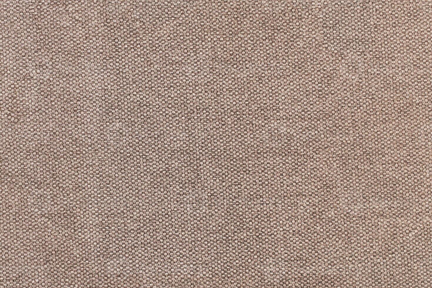Natural Linen Material Textile Canvas Fabric Texture Background Close-up Detail of Fabric Natural Color Hemp Material Pattern Design Wallpaper. Can be Used as Background or For Graphic Design photo