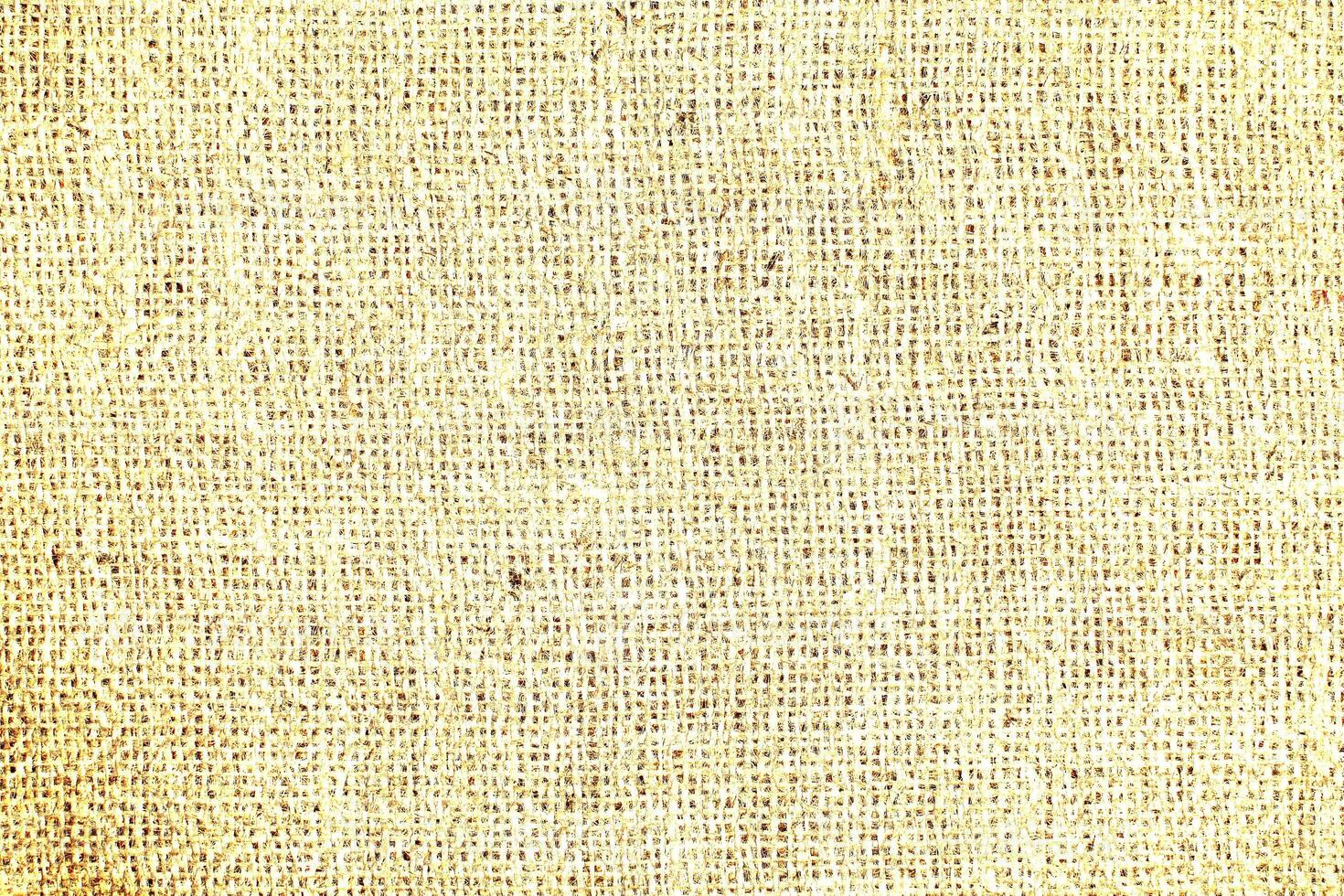 Natural Linen Material Textile Canvas Fabric Texture Background Close-up Detail of Fabric Natural Color Hemp Material Pattern Design Wallpaper. Can be Used as Background or For Graphic Design photo