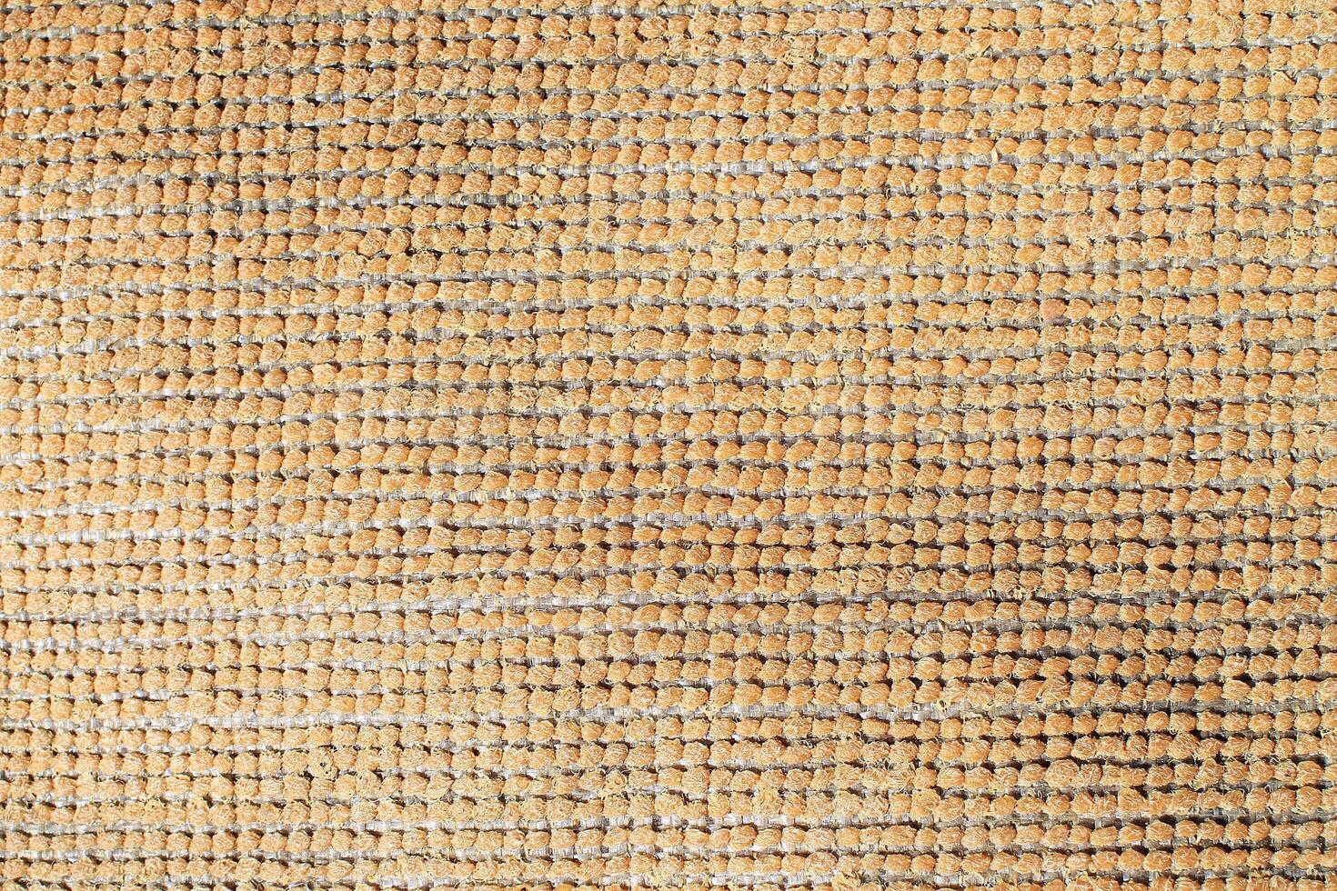 Natural Linen Material Textile Canvas Fabric Texture Background Close-up Detail of Fabric Natural Color Hemp Material Pattern Design Wallpaper. Can be Used as Background or For Graphic Design photo