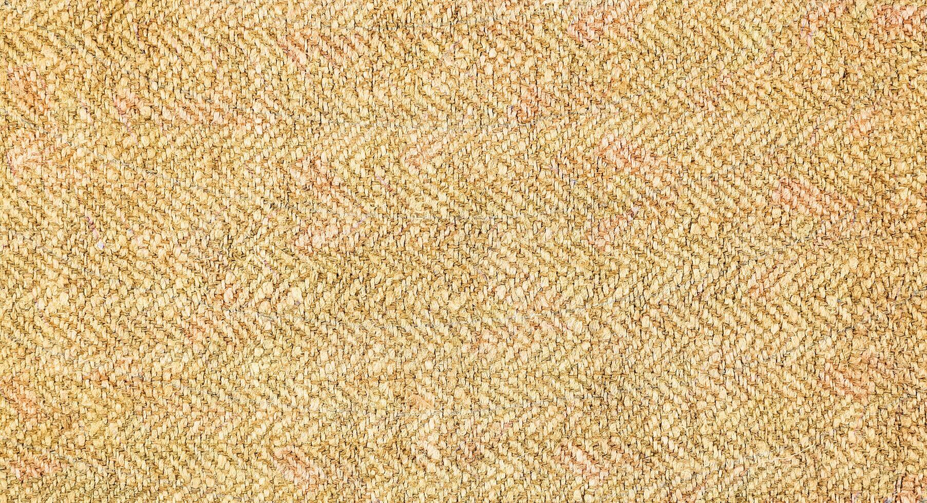 Natural Linen Material Textile Canvas Fabric Texture Background Close-up Detail of Fabric Natural Color Hemp Material Pattern Design Wallpaper. Can be Used as Background or For Graphic Design photo