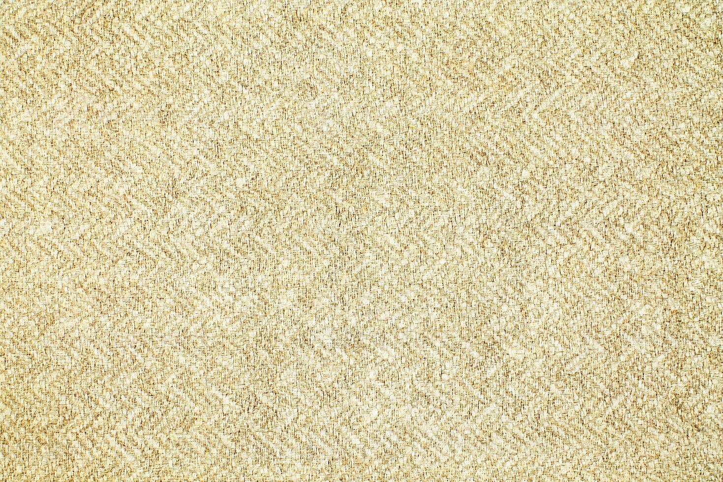 Natural Linen Material Textile Canvas Fabric Texture Background Close-up Detail of Fabric Natural Color Hemp Material Pattern Design Wallpaper. Can be Used as Background or For Graphic Design photo