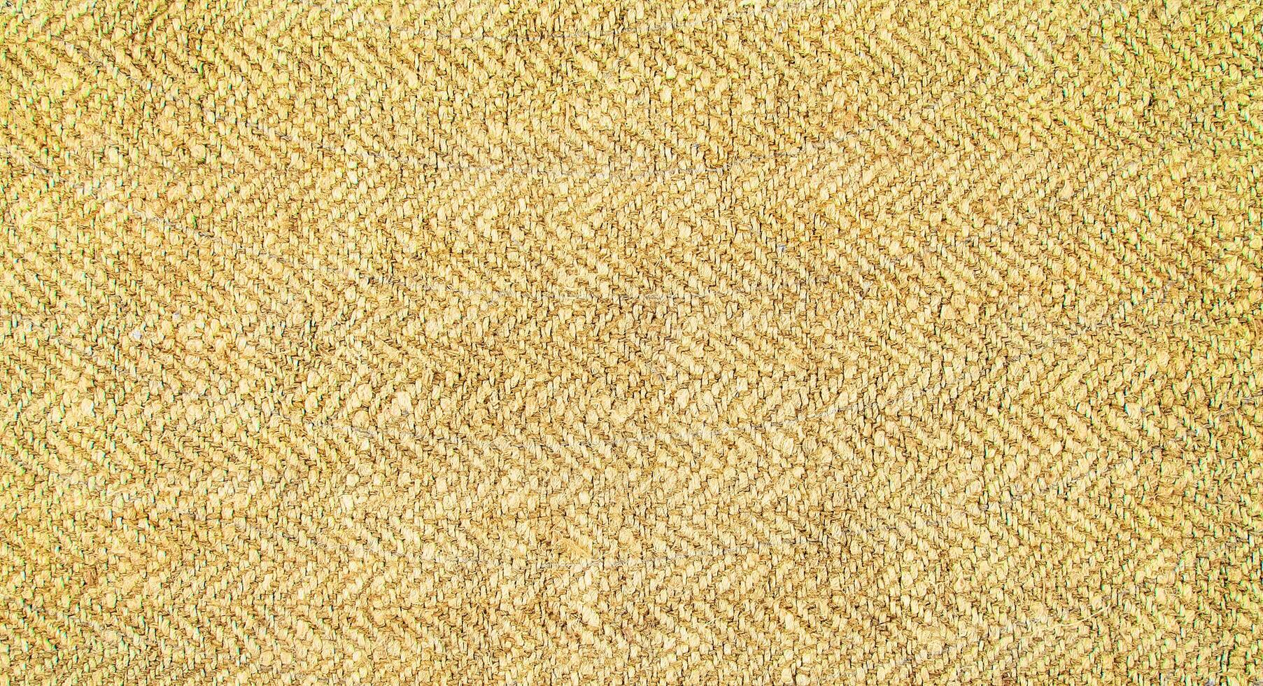 Natural Linen Material Textile Canvas Fabric Texture Background Close-up Detail of Fabric Natural Color Hemp Material Pattern Design Wallpaper. Can be Used as Background or For Graphic Design photo