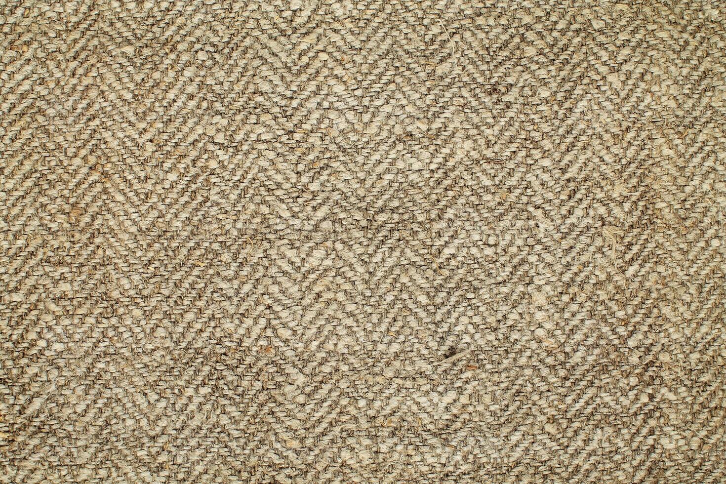 Natural Linen Material Textile Canvas Fabric Texture Background Close-up Detail of Fabric Natural Color Hemp Material Pattern Design Wallpaper. Can be Used as Background or For Graphic Design photo