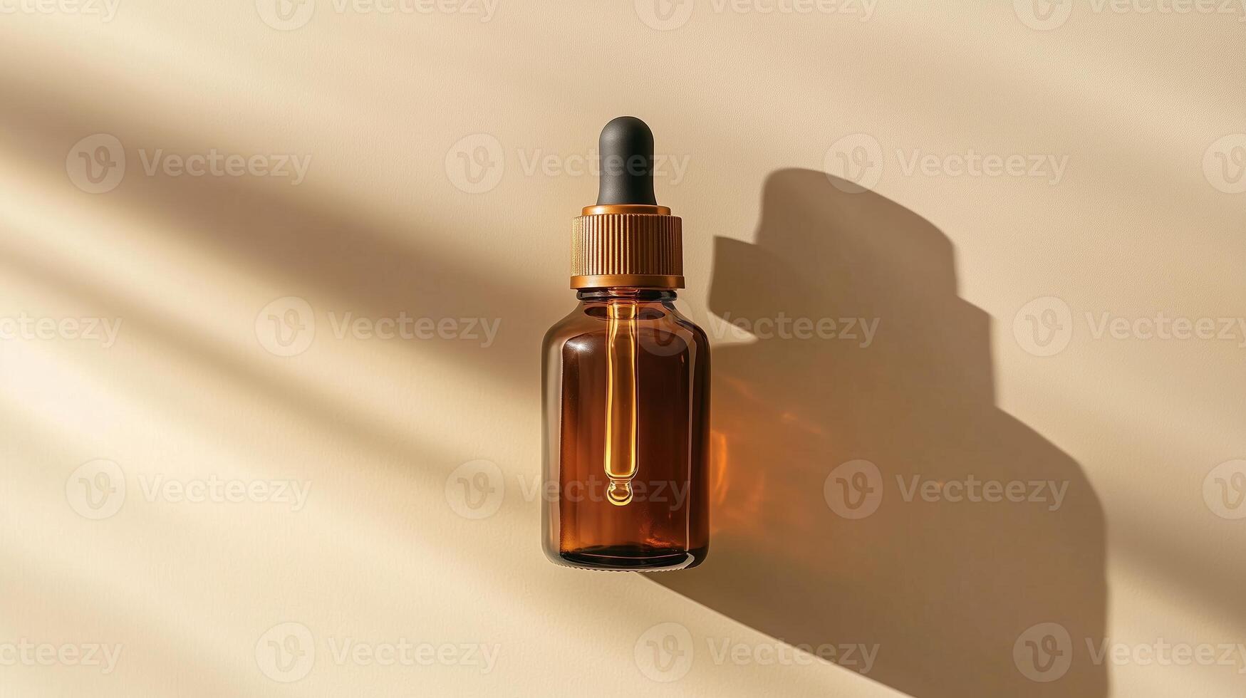 A brown glass bottle with an amber dropper for skin care on beige background. photo