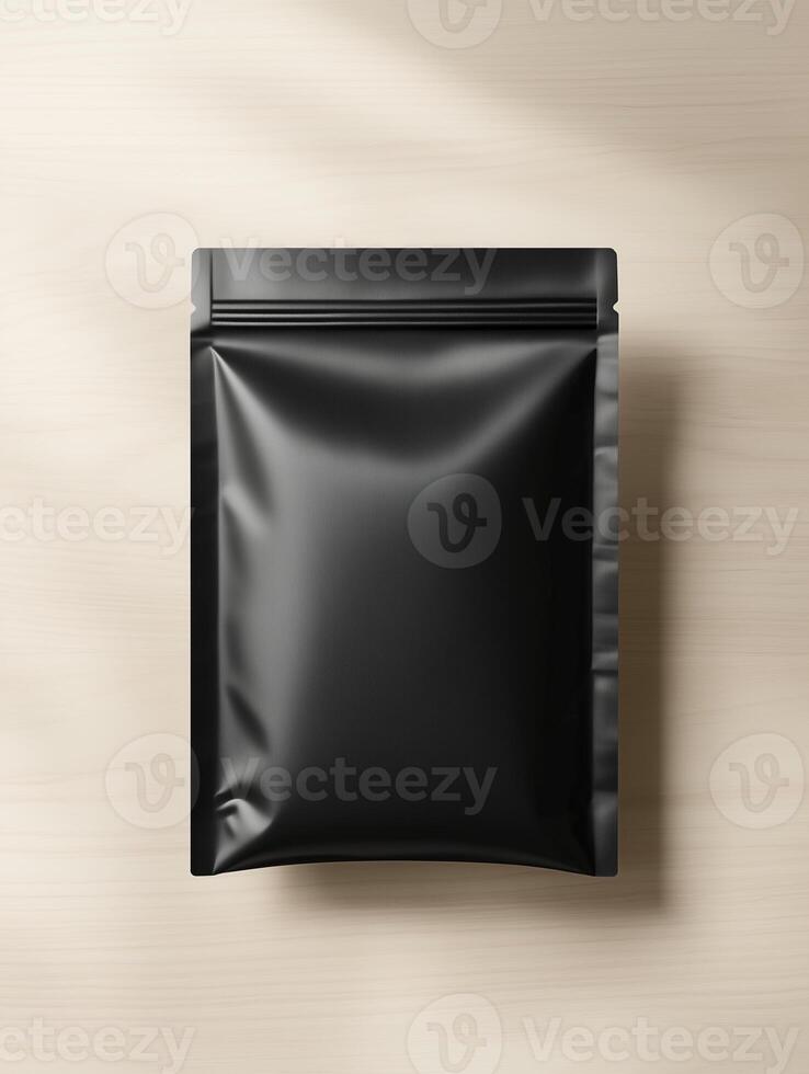 A new black paper packaging bag mockup, on a light wooden table. photo