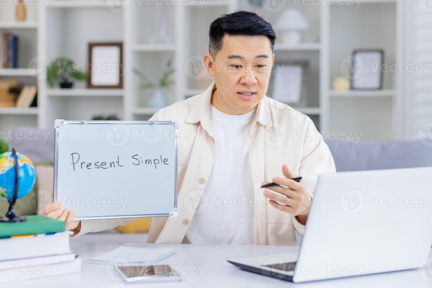 Online English teacher explaining present simple tense during a virtual class using a whiteboard. Remote education concept. photo
