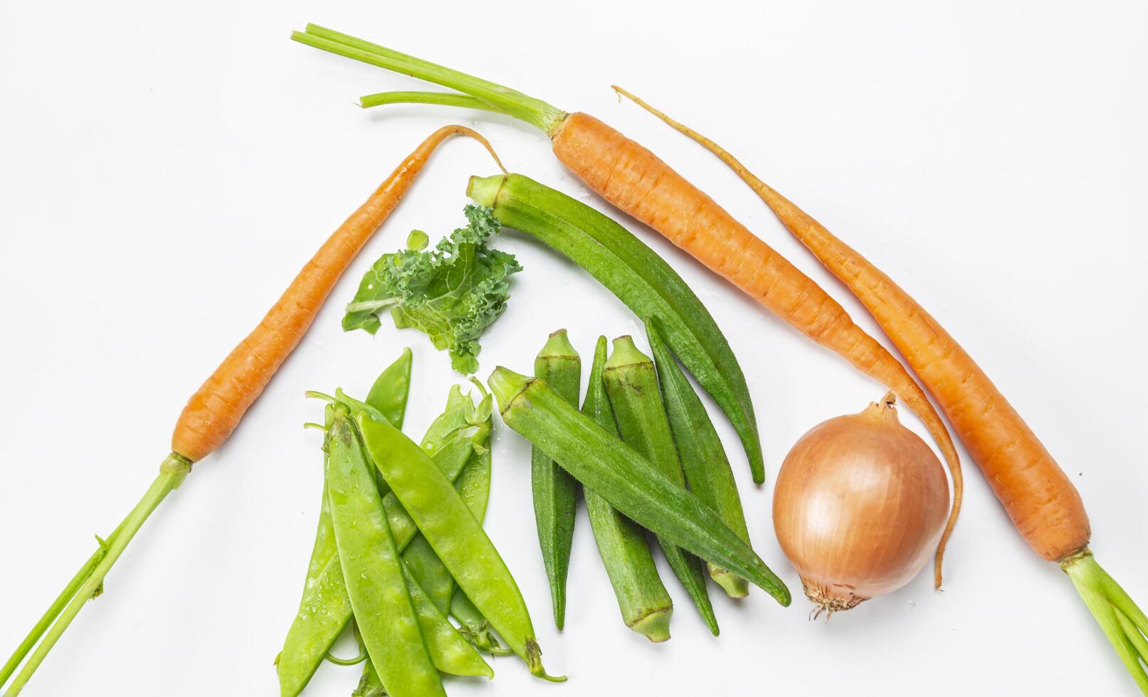 a bunch of vegetables arranged in a heart shape photo