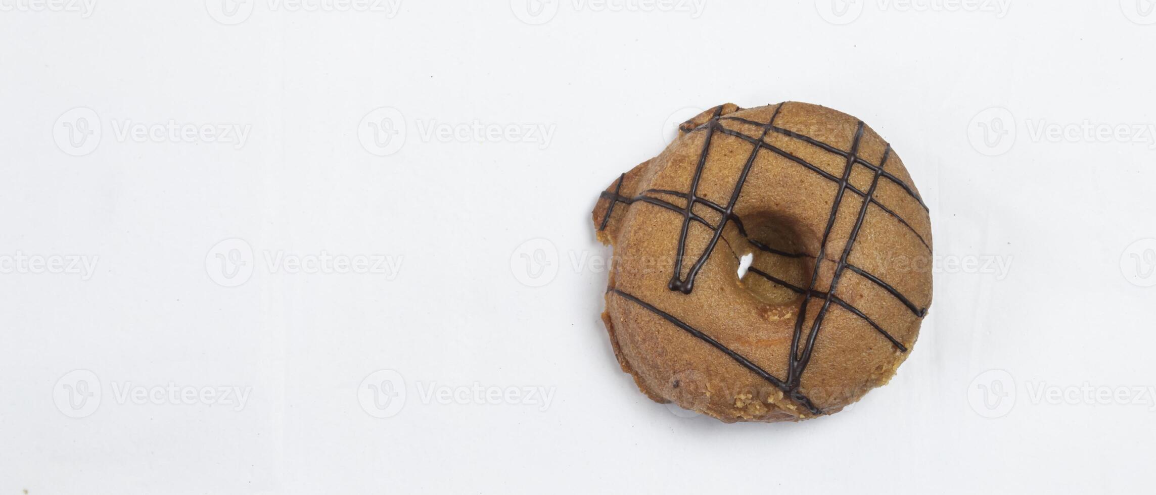 a donut with chocolate icing on top photo