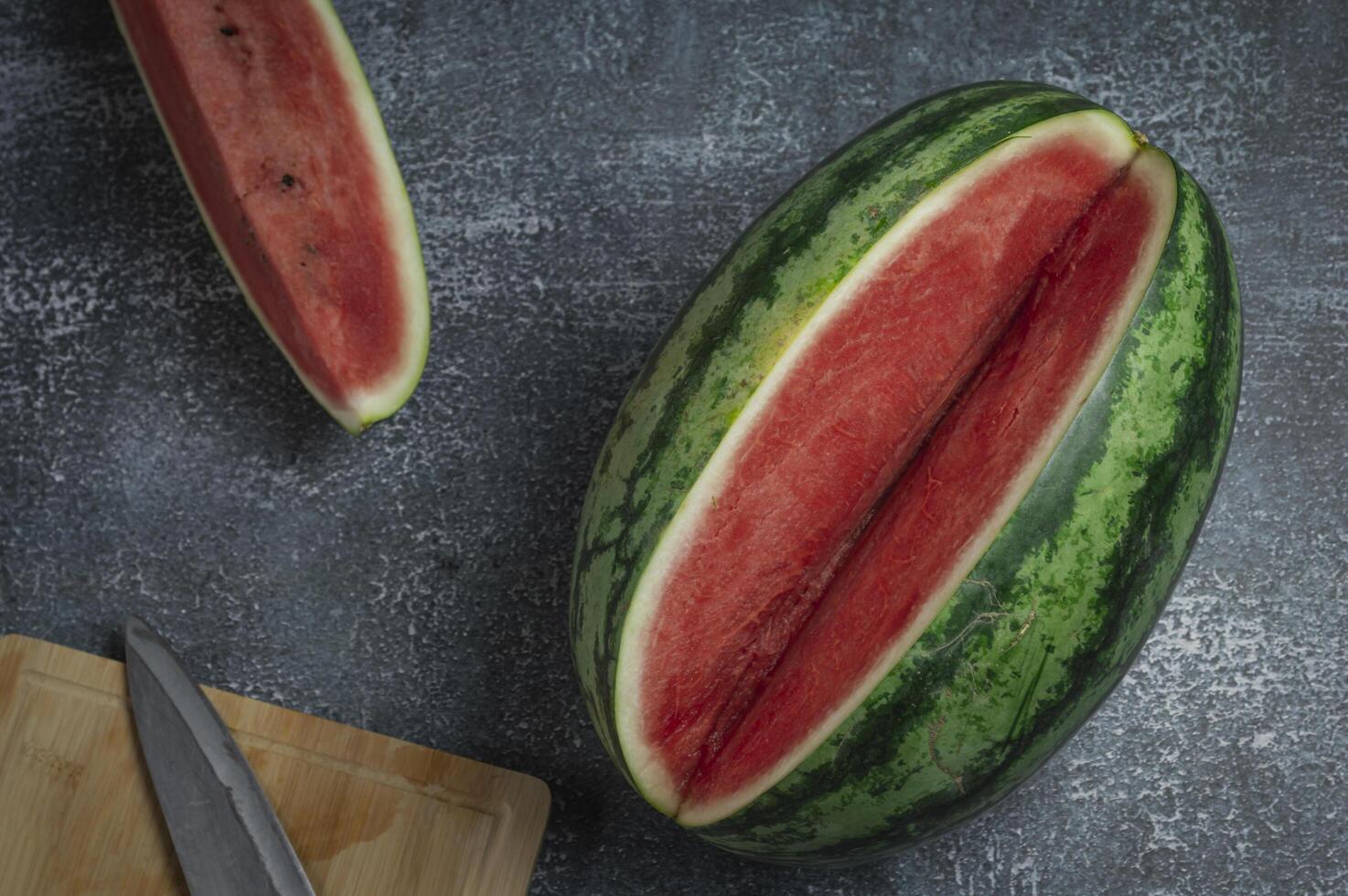 a watermelon cut on a table photo