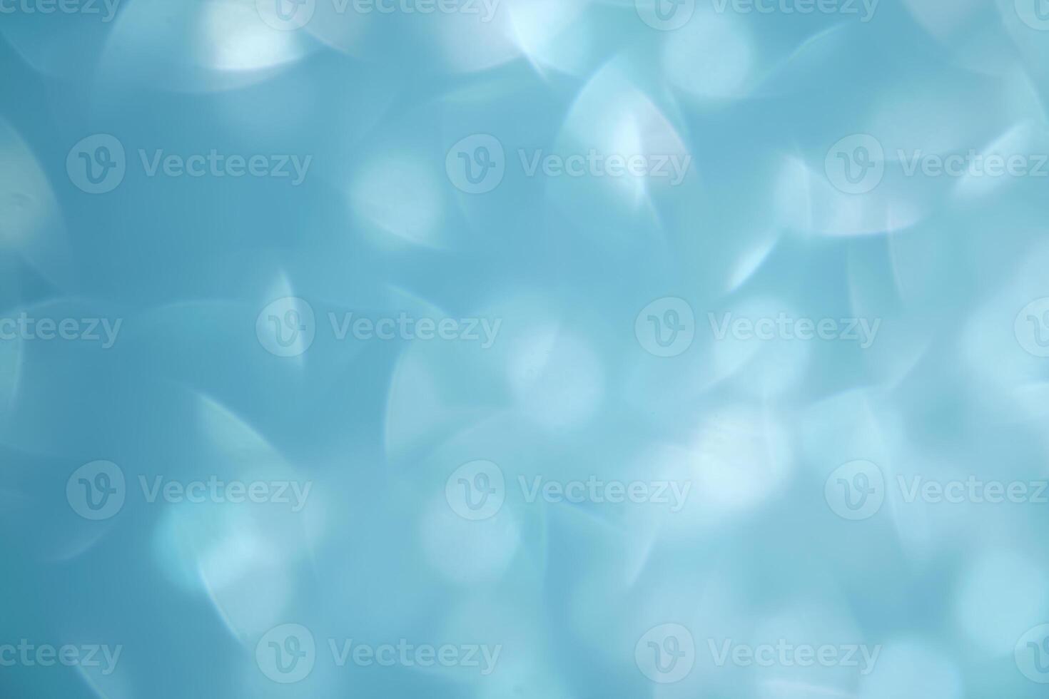 Abstract blue festive christmas background with bokeh. photo