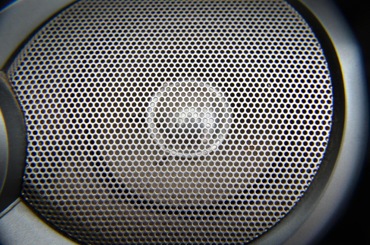Old bobbin tape recorder on a magnetic tape in a metal case photo