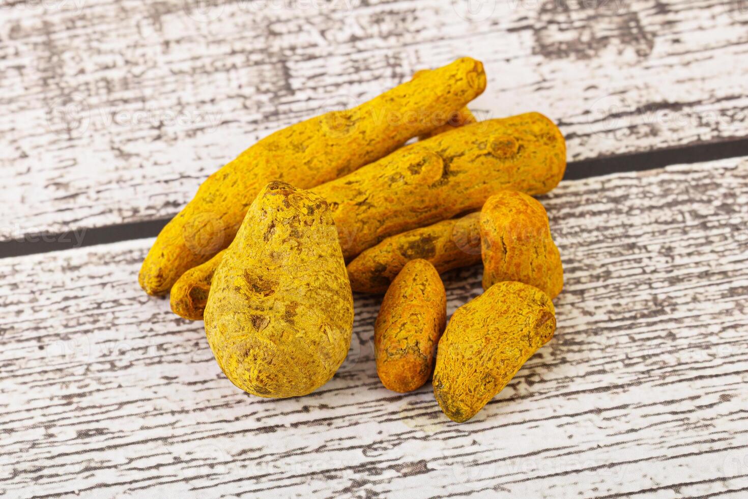 Indian spices - Turmeric root Curcuma photo