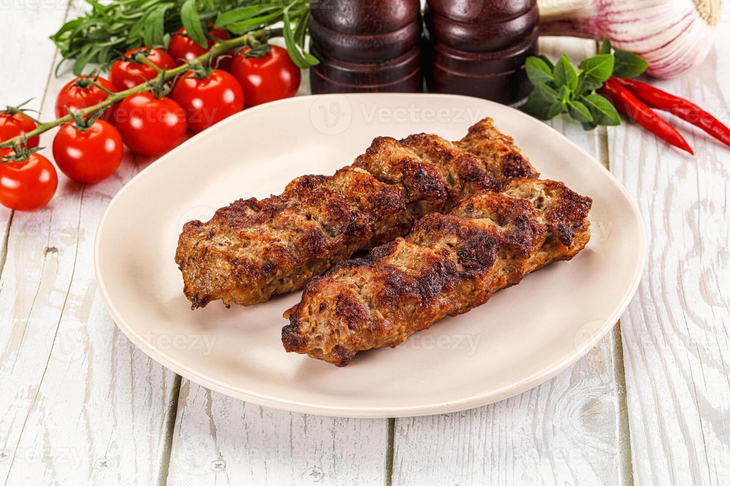 Chicken kebab minced meat and spices photo