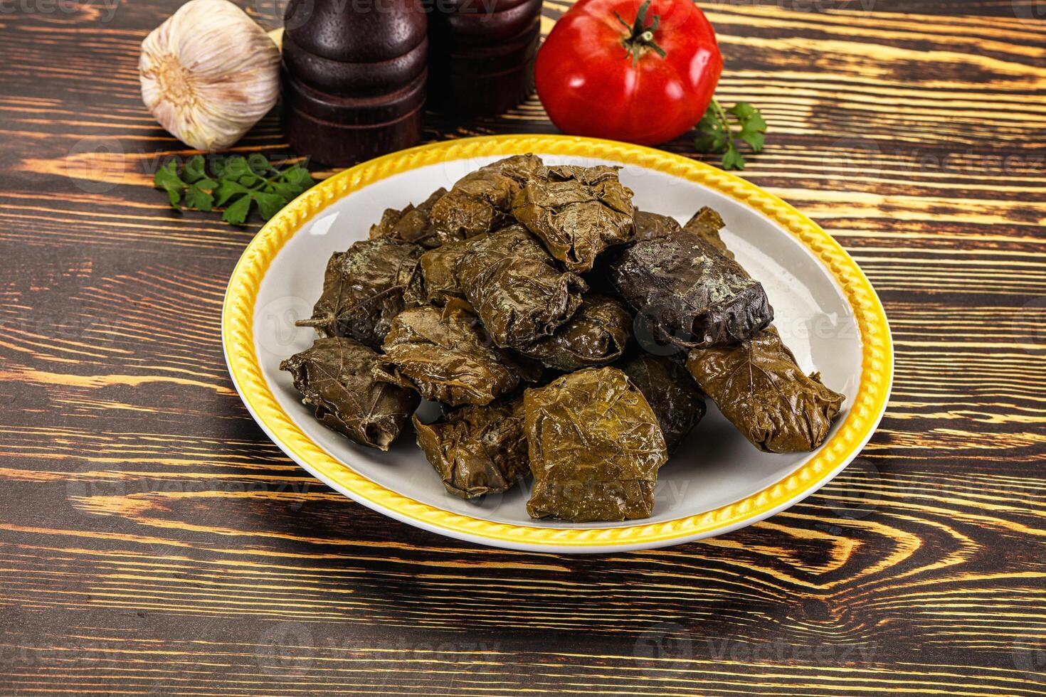 Stuffed dolma - meat in grape leaves photo