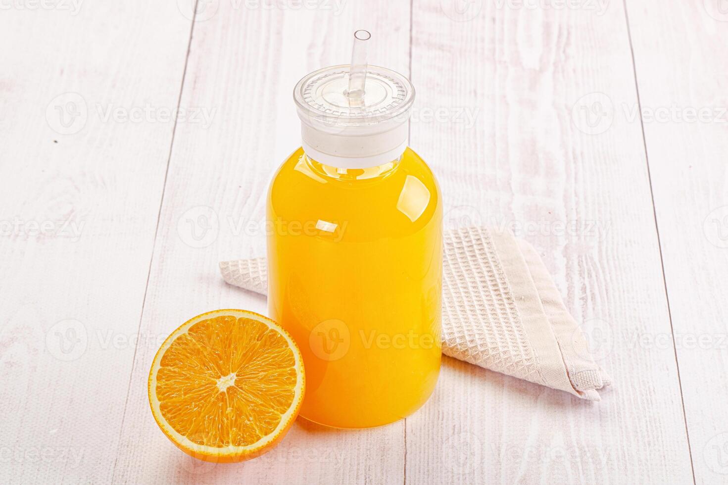 Sweet fresh orange juice in the glass photo