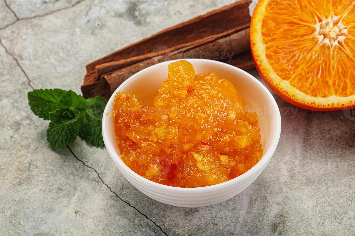 Tasty homemade Orange jam in the bowl photo