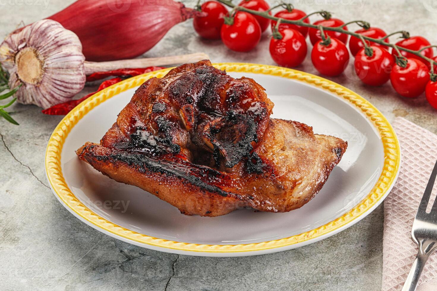Roasted pork knuckle with bone photo