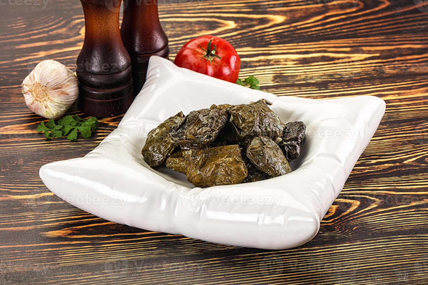 Stuffed dolma - meat in grape leaves photo