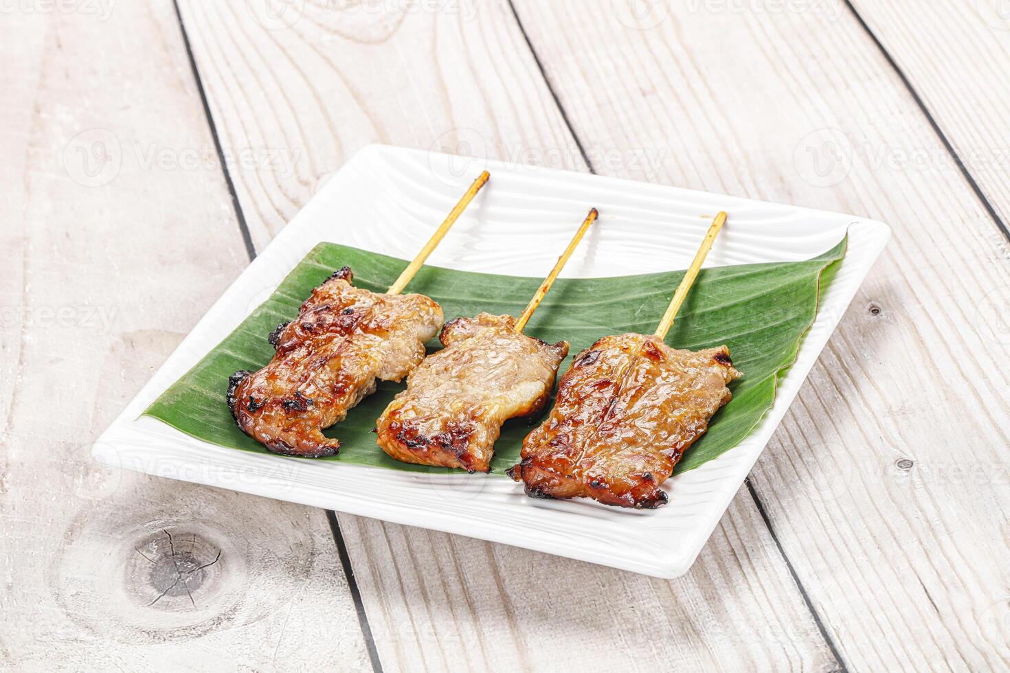 Thai cuisine - grilled pork skewer photo
