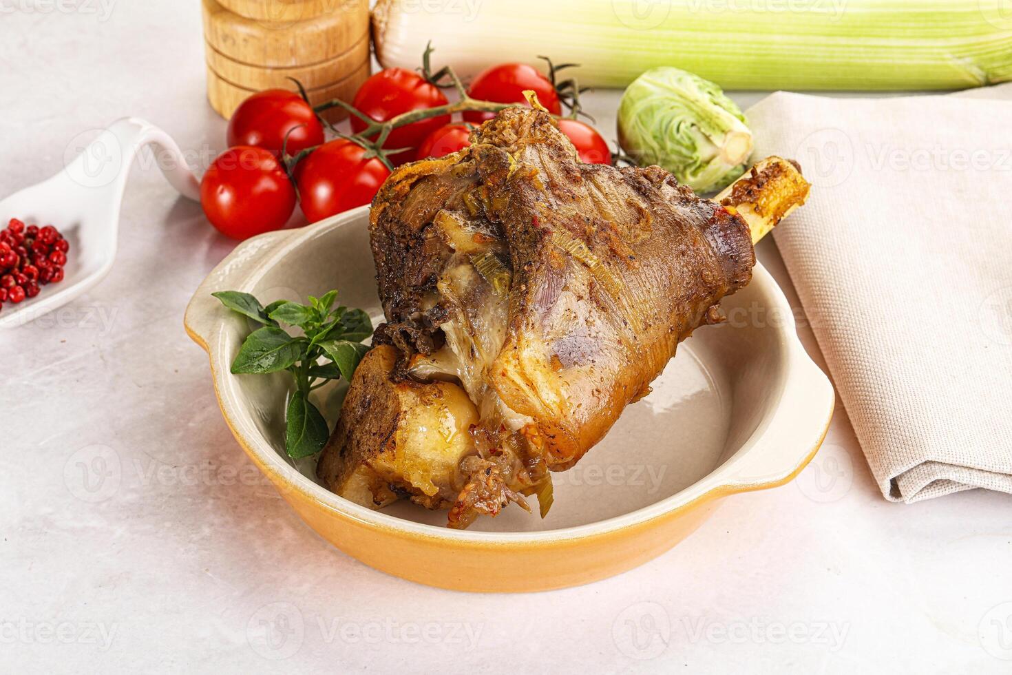 Baked Lamb shank with bone photo