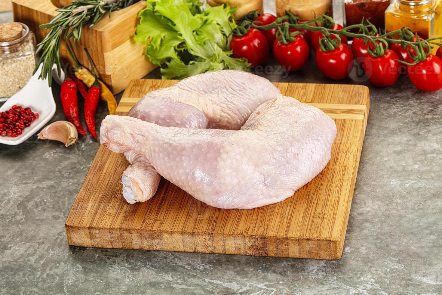 Raw chicken leg foe cooking photo