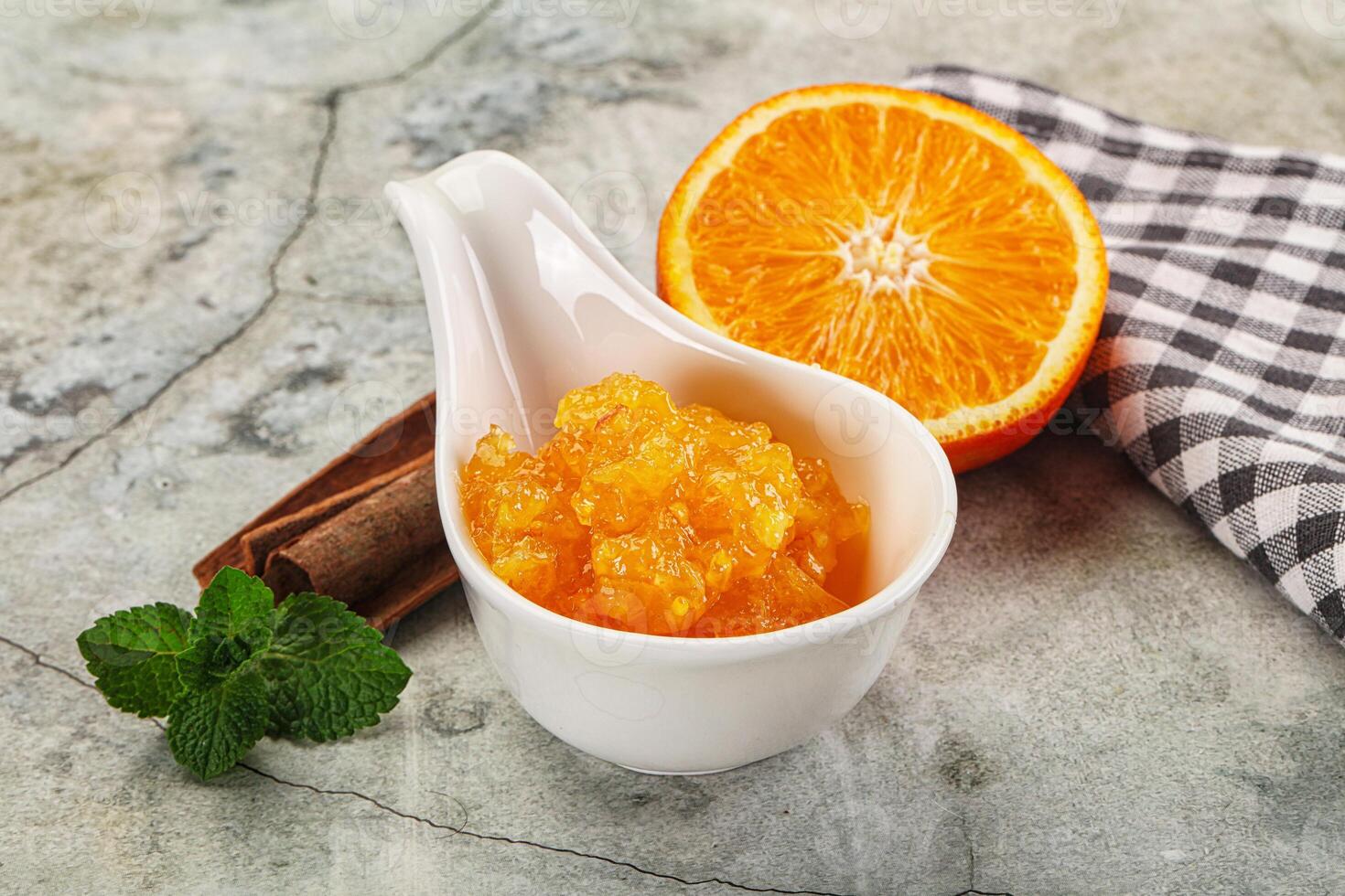 Tasty homemade Orange jam in the bowl photo